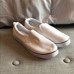 Plain white slip on sneakers